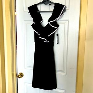 Black dress with white trim ruffle